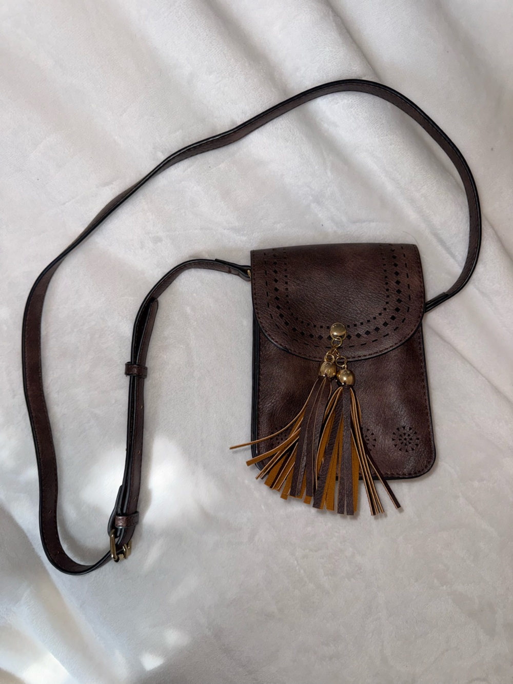 Compact Dark Brown Leather Crossbody Phone Bag with Tassel Accent